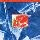 On Every Street on Dire Straits bändin vinyyli LP-levy.