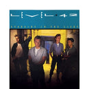 Standing In The Light on Level 42 bändin vinyyli LP-levy.